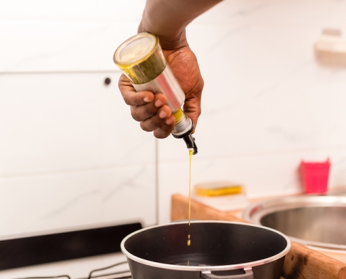 Kitchen gadget pour spout being used in home chefs kitchen
