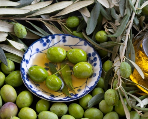bowl of olives in olive oil - Anytime Olive Oil Products Drip-free olive oil spout