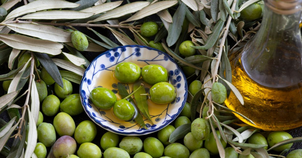 bowl of olives in olive oil - Anytime Olive Oil Products olive oil pour spouts
