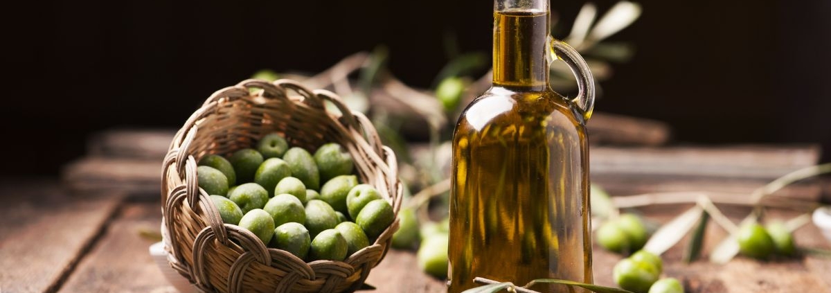 bowl of olives next to a pitcher of olive oil - Anytime Olive Oil Products oil pour spouts