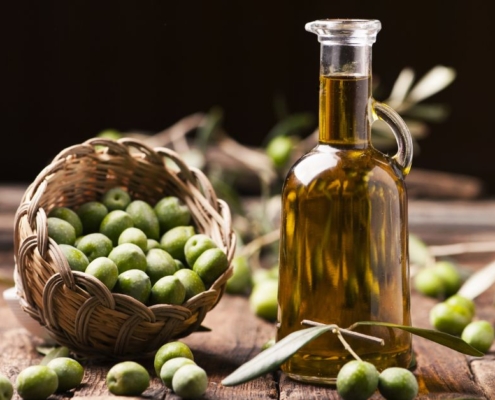 bowl of olives next to a pitcher of olive oil - Anytime Olive Oil Products oil pour spouts