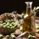 bowl of olives next to a pitcher of olive oil - Anytime Olive Oil Products oil pour spouts