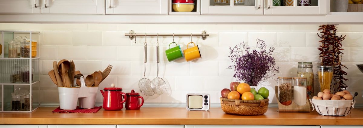 kitchen with white cabinets and light wood counters - Anytime Olive Oil Products olive oil pour spouts