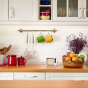 kitchen with white cabinets and light wood counters - Anytime Olive Oil Products olive oil pour spouts