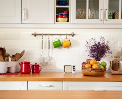 kitchen with white cabinets and light wood counters - Anytime Olive Oil Products olive oil pour spouts