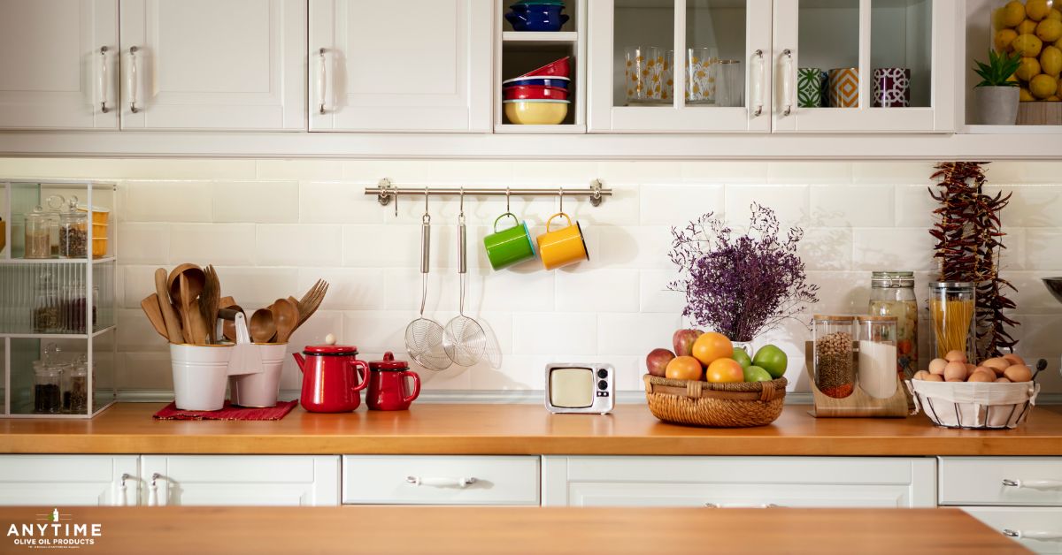 kitchen with white cabinets and light wood counters - Anytime Olive Oil Products olive oil pour spouts