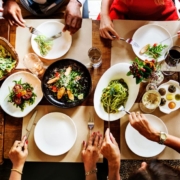 aerial view of a full dinner table at a restaurant - Olive Oil Pour Spouts Anytime Bar Supplies wholesale olive oil pour spouts