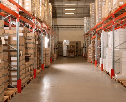 wholesale facility stacked with pallets and boxes - Olive Oil Pour Spouts wholesale olive oil pour spouts