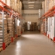 wholesale facility stacked with pallets and boxes - Olive Oil Pour Spouts wholesale olive oil pour spouts