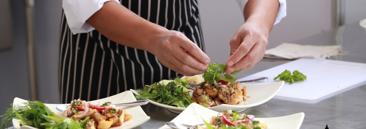 chef plating dishes in a restaurant - Anytime Olive Oil Products olive oil pour spouts