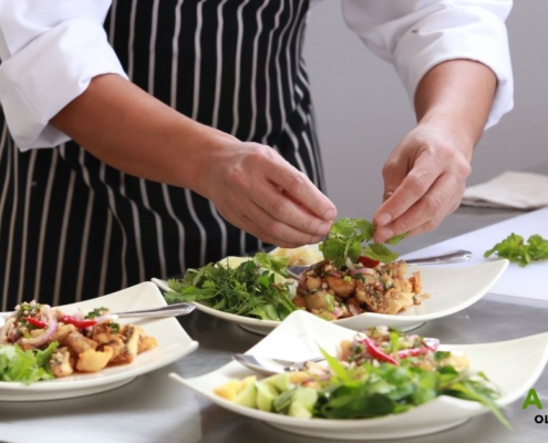 chef plating dishes in a restaurant - Anytime Olive Oil Products olive oil pour spouts