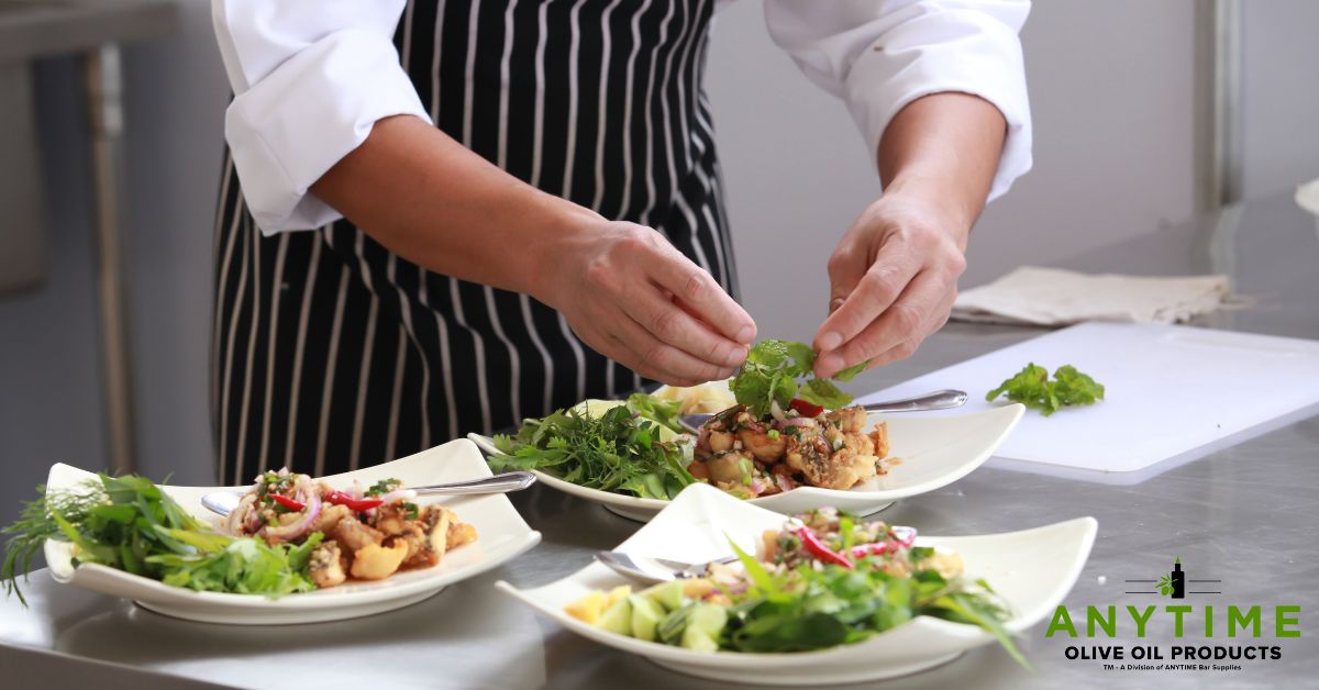 chef plating dishes in a restaurant - Anytime Olive Oil Products olive oil pour spouts