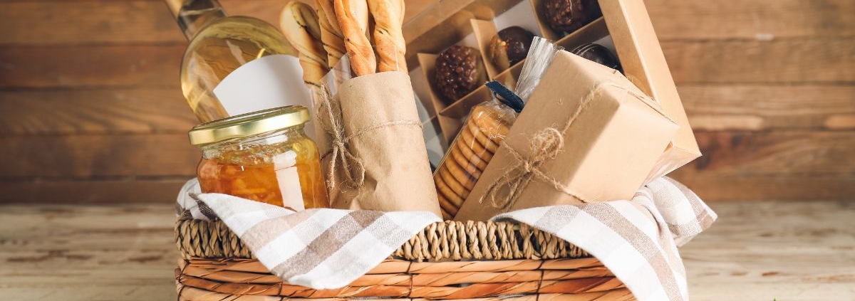 wicker basket full of gourmet wine and jams - Anytime Olive Oil Products oil pour spout