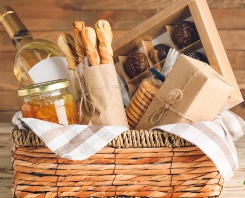 wicker basket full of gourmet wine and jams - Anytime Olive Oil Products oil pour spout