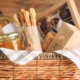 wicker basket full of gourmet wine and jams - Anytime Olive Oil Products oil pour spout