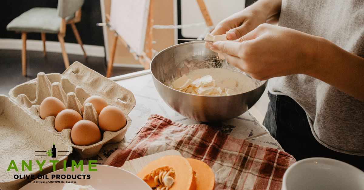 person mixing baked items in a mixing bowl - Olive Oil Pour Spouts oil spout