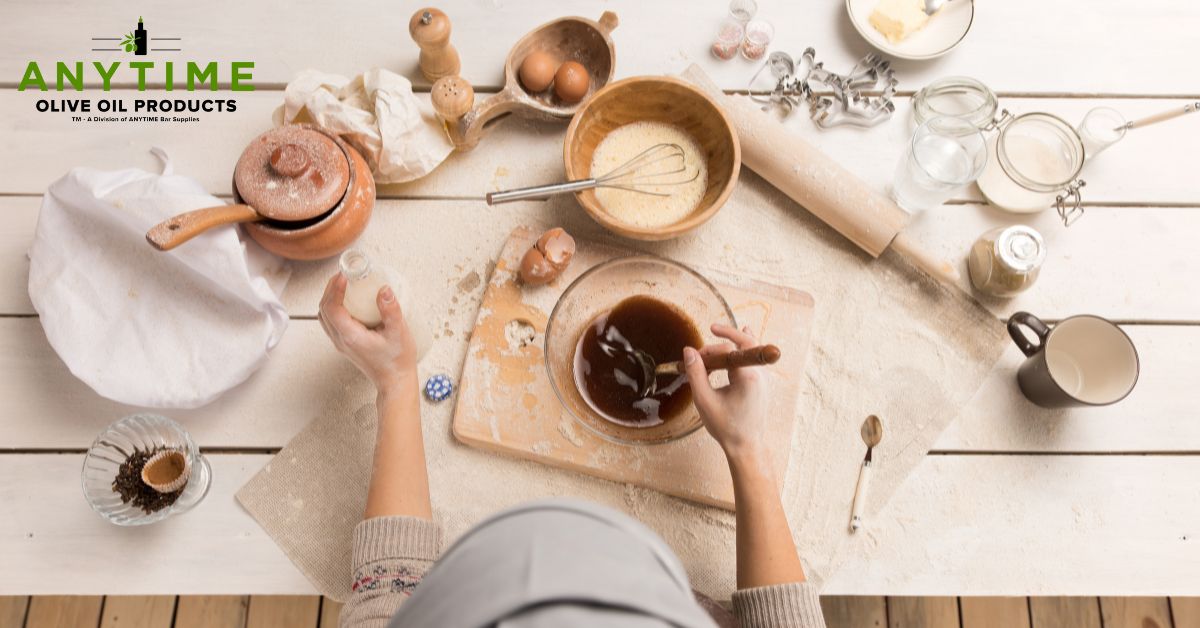person mixing baked items in a mixing bowl - Olive Oil Pour Spouts oil spout