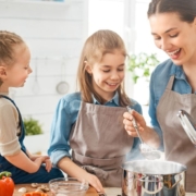 two girls and their mom cooking together - Olive Oil Pour Spouts stainless steel pour spout