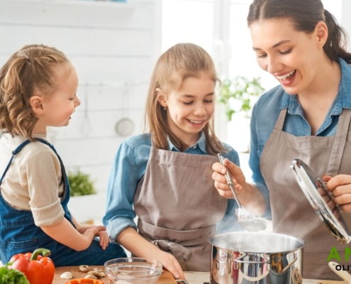 two girls and their mom cooking together - Olive Oil Pour Spouts stainless steel pour spout