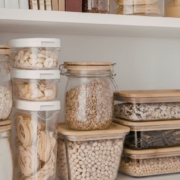 interior of a kitchen pantry with containers of dry goods - Olive Oil Pour Spouts kitchen organization reset