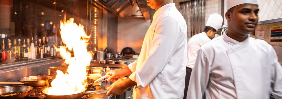 chef cooking with an open flame - Olive Oil Pour Spouts Bulk Stainless Steel Pour Spouts