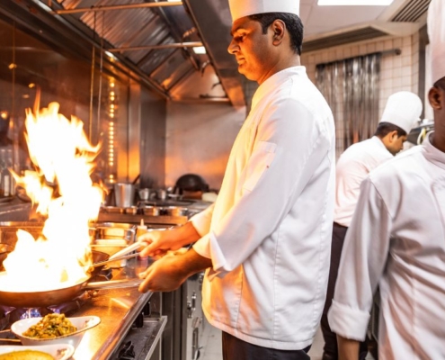 chef cooking with an open flame - Olive Oil Pour Spouts Bulk Stainless Steel Pour Spouts