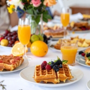 table full of brunch food - Anytime Olive Oil Products aesthetic oil pourers