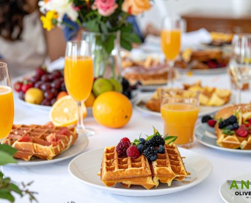 table full of brunch food - Anytime Olive Oil Products aesthetic oil pourers