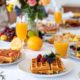 table full of brunch food - Anytime Olive Oil Products aesthetic oil pourers