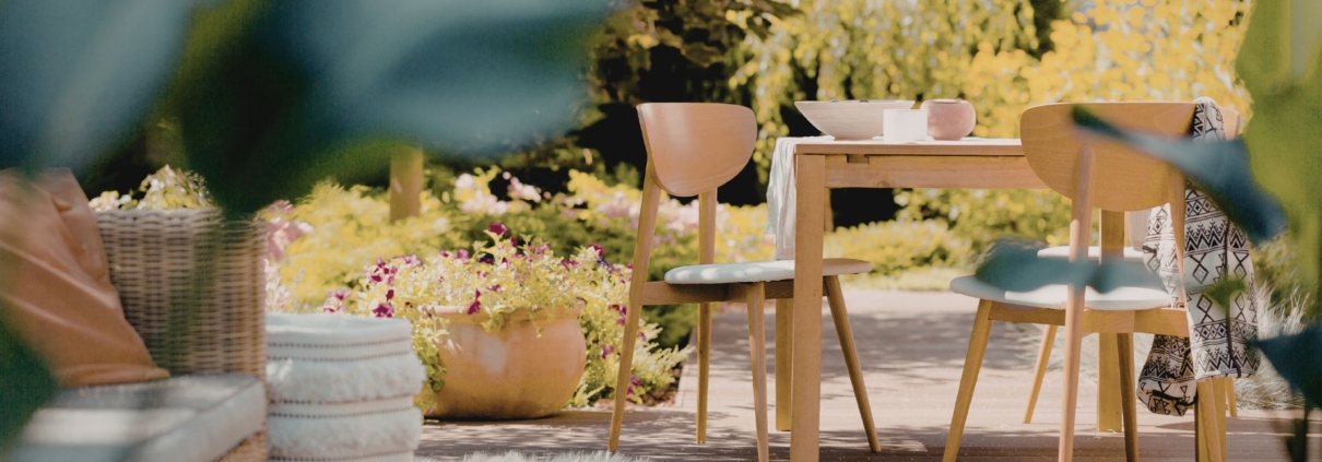 patio area with an empty table and planters - Anytime Olive Oil Products Drip-Free Olive Oil Pour Spouts